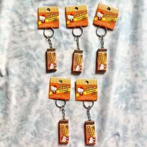 Lot of 5 rare Hello Kitty Sanrio Caramel lip balm keychains - NEW FROM 2010